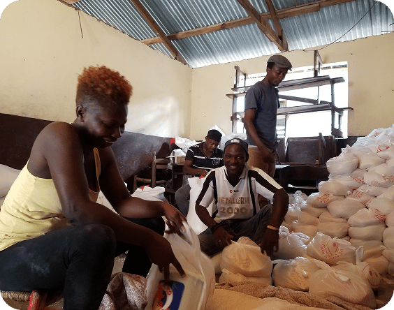 Our Meraki team dividing up food supplies.