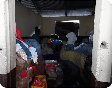 Our Meraki Team gathering clothing supplies.