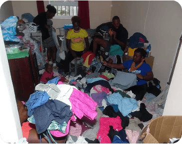 Our Meraki Team gathering clothing supplies.